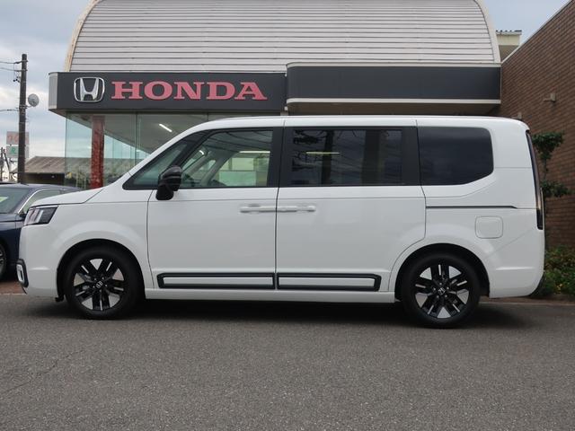 ステップワゴン e:HEVエアー EX 新車未登録 ディーラーオプション装着車(9インチコネクトナビ フォグライトガーニッシュ ボディーサイドモール ドアミラーカバー)2列目オットマン トリプルゾーンAC 運転席助手席シートヒーター(7枚目)