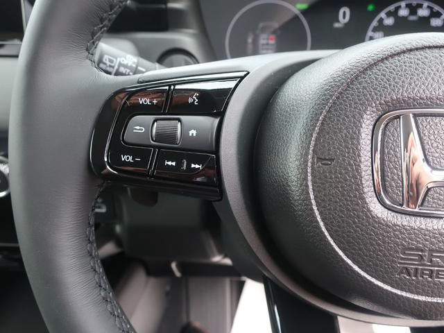 ヴェゼル ｅ：ＨＥＶ　Ｚ　新車未登録　ディーラーオプション装着車（フロントグリル　フォグライトガーニッシュ　Ｆロアスカート　ブラックエンブレム　ドアミラーカバー）ブラインドスポットインフォメーション　パワーテールゲート（24枚目）