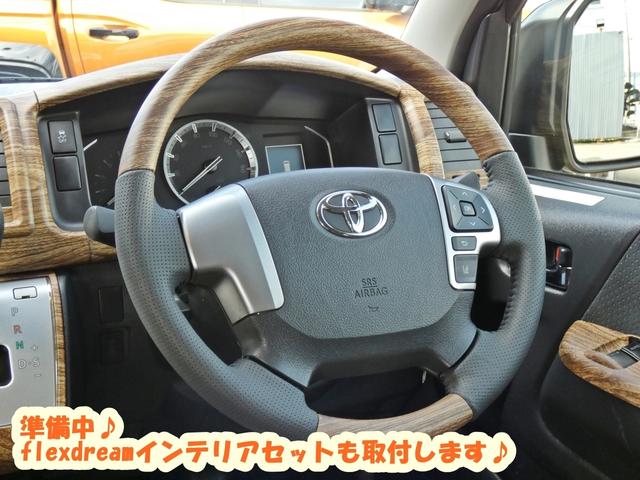 ハイエースバン ロングスーパーＧＬ　Ｓ－ＧＬアースカラーパッケージ　丸目ライト　クラシックフェイス　ベッドキット　シートカバー　アルパインＢｉｇＸメカレスナビ　両側パワースライドドア　インテリジェントクリアランスソナー　衝突被害軽減ブレ（4枚目）