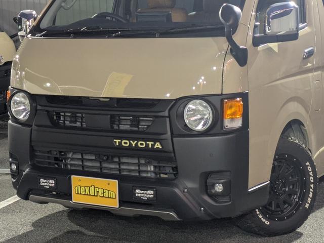 ハイエースバン ロングスーパーＧＬ　アースカラーパッケージ　両側パワースライドドア　パノラミックビューモニター　アルパイン１１型ナビ　丸目カスタム　ベッドキット　シートカバー　衝突被害軽減ブレーキ　インテリジェントクリアランスソナー（2枚目）