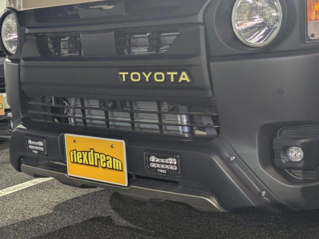 ハイエースバン ロングスーパーＧＬ　アースカラーパッケージ　両側パワースライドドア　パノラミックビューモニター　アルパイン１１型ナビ　丸目カスタム　ベッドキット　シートカバー　衝突被害軽減ブレーキ　インテリジェントクリアランスソナー（4枚目）