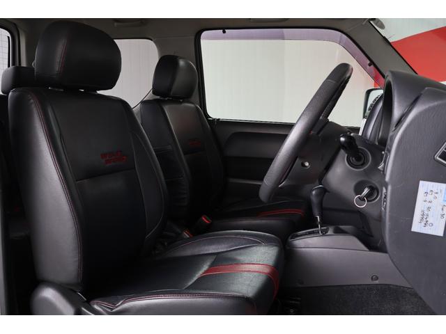 ジムニー ワイルドウインド 禁煙/レザーシート/シートヒーター/革巻きステアリングホイール/純正16AW/ルーフレール/フロントフォグランプ/ボディ同色背面ハードカバー/プライバシーガラス/キーレスエントリー/当店直接買取(5枚目)