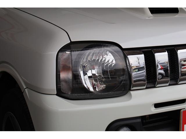 ジムニー ワイルドウインド 禁煙/レザーシート/シートヒーター/革巻きステアリングホイール/純正16AW/ルーフレール/フロントフォグランプ/ボディ同色背面ハードカバー/プライバシーガラス/キーレスエントリー/当店直接買取(7枚目)