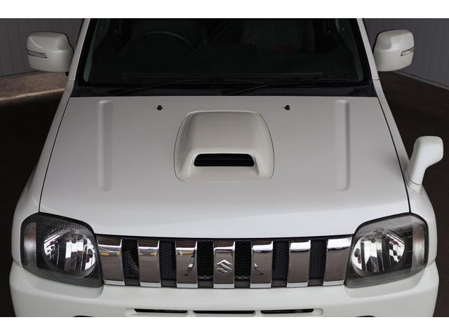 ジムニー ワイルドウインド 禁煙/レザーシート/シートヒーター/革巻きステアリングホイール/純正16AW/ルーフレール/フロントフォグランプ/ボディ同色背面ハードカバー/プライバシーガラス/キーレスエントリー/当店直接買取(14枚目)