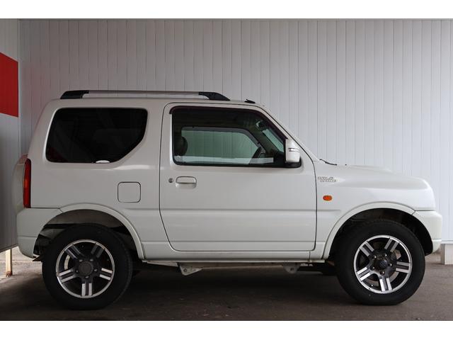 ジムニー ワイルドウインド 禁煙/レザーシート/シートヒーター/革巻きステアリングホイール/純正16AW/ルーフレール/フロントフォグランプ/ボディ同色背面ハードカバー/プライバシーガラス/キーレスエントリー/当店直接買取(17枚目)