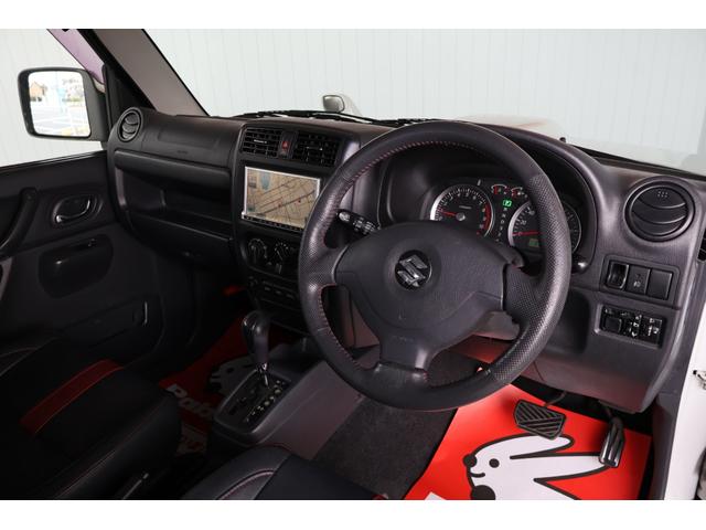 ジムニー ワイルドウインド 禁煙/レザーシート/シートヒーター/革巻きステアリングホイール/純正16AW/ルーフレール/フロントフォグランプ/ボディ同色背面ハードカバー/プライバシーガラス/キーレスエントリー/当店直接買取(20枚目)