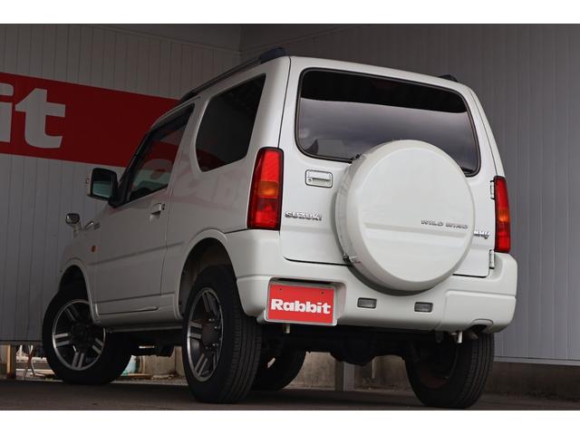 ジムニー ワイルドウインド 禁煙/レザーシート/シートヒーター/革巻きステアリングホイール/純正16AW/ルーフレール/フロントフォグランプ/ボディ同色背面ハードカバー/プライバシーガラス/キーレスエントリー/当店直接買取(32枚目)