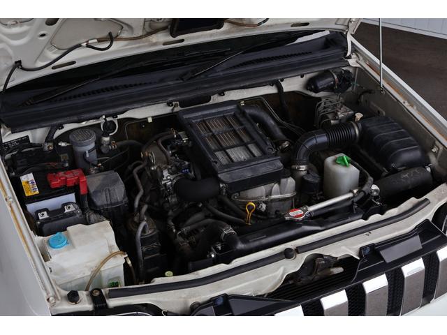 ジムニー ワイルドウインド 禁煙/レザーシート/シートヒーター/革巻きステアリングホイール/純正16AW/ルーフレール/フロントフォグランプ/ボディ同色背面ハードカバー/プライバシーガラス/キーレスエントリー/当店直接買取(33枚目)