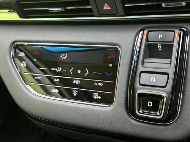 オデッセイハイブリッド eHEVアブソルート・EX 保証書/純正 11インチ メモリーナビ/フリップダウンモニター 純正 12.8インチ/ホンダセンシング/両側電動スライドドア/シートヒーター 全席/マルチビューカメラシステム/シート 合皮 電動シート(18枚目)