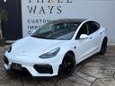 モデル３ ロングレンジ　正規ディーラー車　買取車　ＧＴ４フェイス　ワンオーナー　フルカスタム　グロスブラックホイールロングレンジ　ブラックレザーシート　パノラマガラスルーフ　充電ケーブル付き（7枚目）