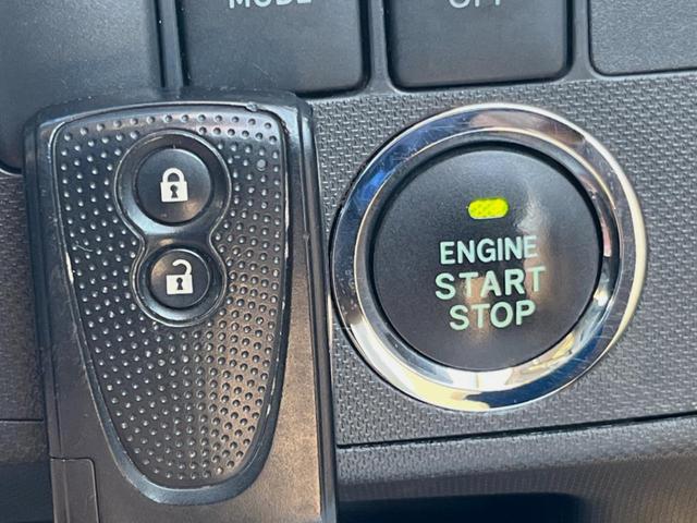 ムーヴ カスタム Xリミテッド 純正SDナビ バックカメラ 禁煙車 スマートキー HIDヘッド ETC オートエアコン 純正14インチアルミ CD 地デジ シートリフター 電動格納ミラー アームレスト アイドリングストップ(6枚目)