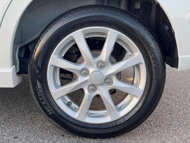 ムーヴ カスタム Xリミテッド 純正SDナビ バックカメラ 禁煙車 スマートキー HIDヘッド ETC オートエアコン 純正14インチアルミ CD 地デジ シートリフター 電動格納ミラー アームレスト アイドリングストップ(35枚目)