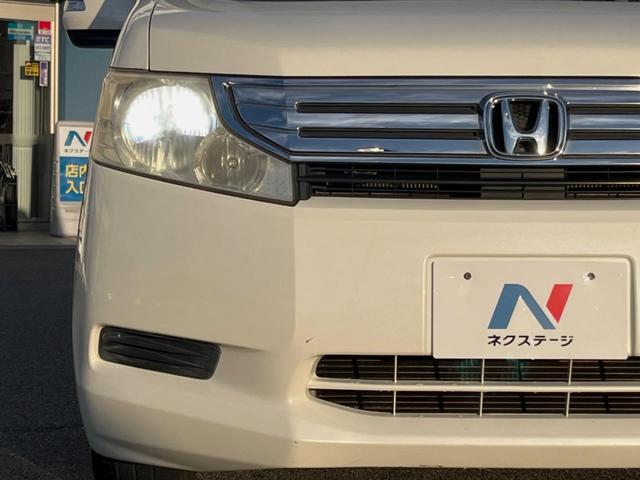 ステップワゴン Ｇ　ＨＩＤエディション　両側電動ドア　禁煙車　ＨＩＤヘッド　オートライト　ＥＴＣ　オートエアコン　ＣＤ　ＤＶＤ再生　バックカメラ　電動格納ドアミラー　キーレスキー　シートリフター　シートベルトアジャスター　前席バニティミラー（14枚目）