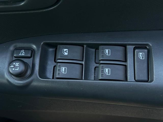 タント カスタムX 電動スライドドア 純正HDDナビ 禁煙車 スマートキー HIDヘッド ドライブレコーダー ETC オートエアコン 純正14インチアルミ CD再生 電動格納ドアミラー 収納付アームレスト シートリフター(9枚目)