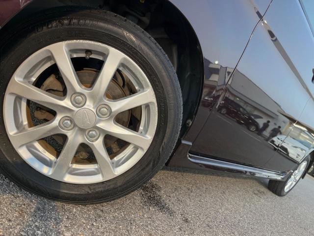 タント カスタムX 電動スライドドア 純正HDDナビ 禁煙車 スマートキー HIDヘッド ドライブレコーダー ETC オートエアコン 純正14インチアルミ CD再生 電動格納ドアミラー 収納付アームレスト シートリフター(15枚目)