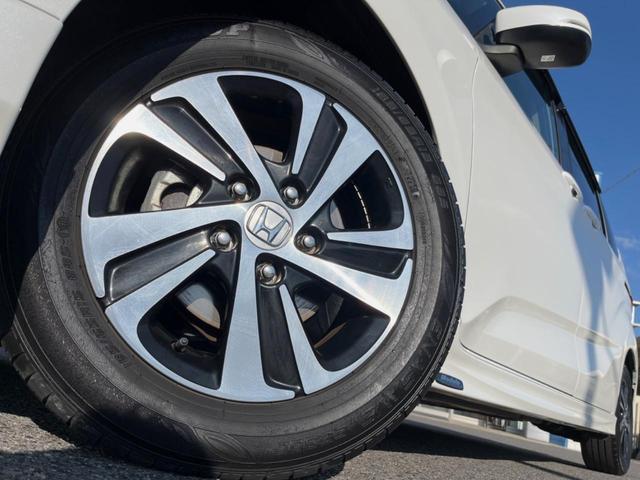 フリード G・ホンダセンシング 両側電動ドア 後席モニター モデューロエアロ バックカメラ 衝突被害軽減システム 禁煙車 ドラレコ スマートキー LEDヘッド ビルトインETC 純正15インチアルミ オートライト Bluetooth(15枚目)