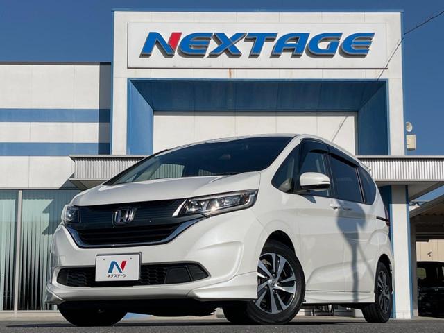 フリード G・ホンダセンシング 両側電動ドア 後席モニター モデューロエアロ バックカメラ 衝突被害軽減システム 禁煙車 ドラレコ スマートキー LEDヘッド ビルトインETC 純正15インチアルミ オートライト Bluetooth(18枚目)