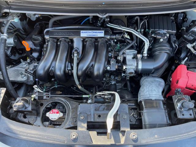 フリード G・ホンダセンシング 両側電動ドア 後席モニター モデューロエアロ バックカメラ 衝突被害軽減システム 禁煙車 ドラレコ スマートキー LEDヘッド ビルトインETC 純正15インチアルミ オートライト Bluetooth(19枚目)