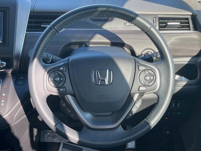 フリード G・ホンダセンシング 両側電動ドア 後席モニター モデューロエアロ バックカメラ 衝突被害軽減システム 禁煙車 ドラレコ スマートキー LEDヘッド ビルトインETC 純正15インチアルミ オートライト Bluetooth(22枚目)