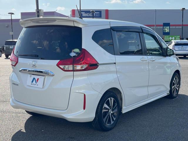 フリード G・ホンダセンシング 両側電動ドア 後席モニター モデューロエアロ バックカメラ 衝突被害軽減システム 禁煙車 ドラレコ スマートキー LEDヘッド ビルトインETC 純正15インチアルミ オートライト Bluetooth(52枚目)