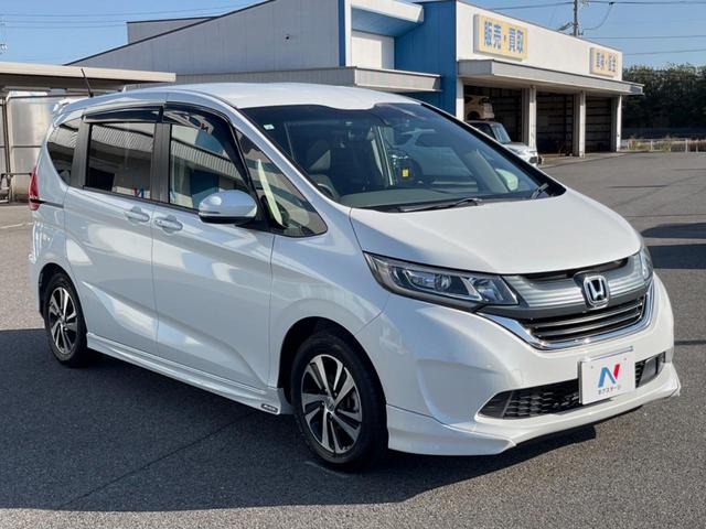 フリード G・ホンダセンシング 両側電動ドア 後席モニター モデューロエアロ バックカメラ 衝突被害軽減システム 禁煙車 ドラレコ スマートキー LEDヘッド ビルトインETC 純正15インチアルミ オートライト Bluetooth(58枚目)