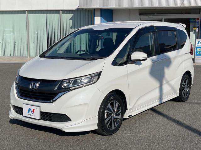 フリード G・ホンダセンシング 両側電動ドア 後席モニター モデューロエアロ バックカメラ 衝突被害軽減システム 禁煙車 ドラレコ スマートキー LEDヘッド ビルトインETC 純正15インチアルミ オートライト Bluetooth(59枚目)