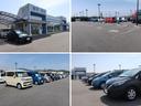 大きなNマークの看板が目印!広々とした駐車場をご用意してお待ちしております。展示場には豊富な在庫をご用意。メーカー問わず比較していただけます。