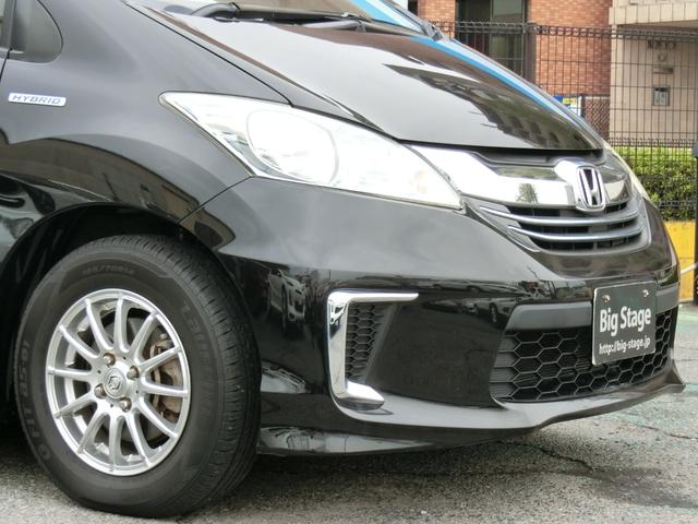 フリードハイブリッド ハイブリッド プレミアムエディション プレミア故障保証ゴールド1年付 両側パワースライドドア 純正ナビ フルセグ BT Bカメラ 純正FDモニター ハーフレザーシート 革巻ステアリング スマートキー2個 ETC HIDヘッドライト(6枚目)