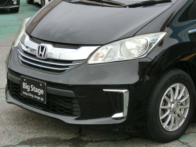 フリードハイブリッド ハイブリッド プレミアムエディション プレミア故障保証ゴールド1年付 両側パワースライドドア 純正ナビ フルセグ BT Bカメラ 純正FDモニター ハーフレザーシート 革巻ステアリング スマートキー2個 ETC HIDヘッドライト(7枚目)