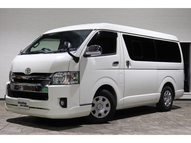 ハイエースバン ロングワイドスーパーGL 4型モデル・ミドルルーフワイド・8ナンバー2年車検・エセックスFリップ・フリップダウンモニタ・SDナビ・ETC・ドライブレコーダ・シートカバ・荷室床張り施工・ディーゼル・AC100V(2枚目)