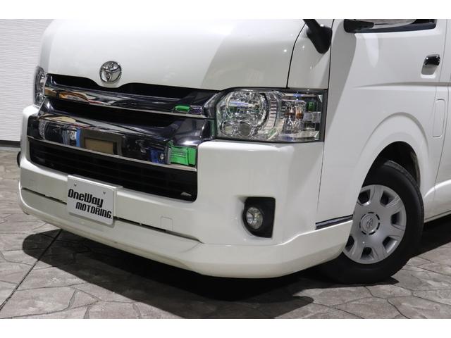 ハイエースバン ロングワイドスーパーGL 4型モデル・ミドルルーフワイド・8ナンバー2年車検・エセックスFリップ・フリップダウンモニタ・SDナビ・ETC・ドライブレコーダ・シートカバ・荷室床張り施工・ディーゼル・AC100V(5枚目)