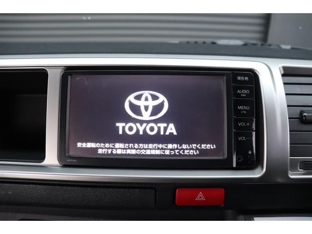 ハイエースバン ロングワイドスーパーGL 4型モデル・ミドルルーフワイド・8ナンバー2年車検・エセックスFリップ・フリップダウンモニタ・SDナビ・ETC・ドライブレコーダ・シートカバ・荷室床張り施工・ディーゼル・AC100V(23枚目)