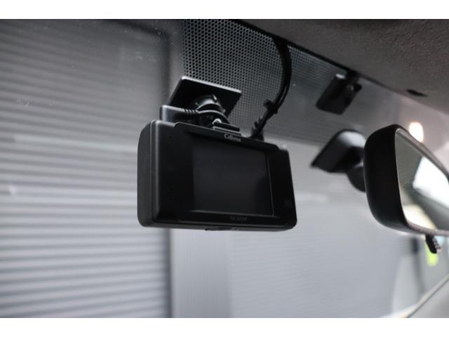 ハイエースバン ロングワイドスーパーGL 4型モデル・ミドルルーフワイド・8ナンバー2年車検・エセックスFリップ・フリップダウンモニタ・SDナビ・ETC・ドライブレコーダ・シートカバ・荷室床張り施工・ディーゼル・AC100V(24枚目)