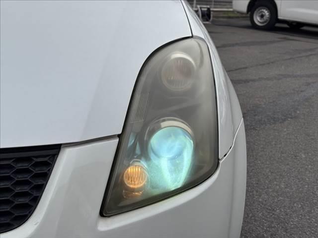 スイフト スポーツリミテッド 禁煙車 HDDナビ HIDヘッドライト スマートキー 純正16インチAW ETC パワーウィンドウ オートエアコン パワーステアリング 運転席エアバッグ 助手席エアバッグ 電動格納ミラー(10枚目)