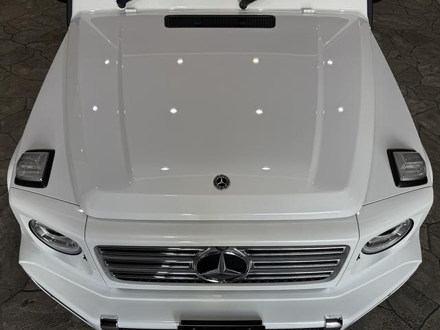 Gクラス G400d AMGライン マヌファクトゥーアプログラム 買取車 AMGライン ディーラー記録簿R5年/R6年 有償色オパリスホワイト ラグジュアリーP ベンガルレッドナッパレザー SR ブルメスタ シートヒーター/クーラー(26枚目)