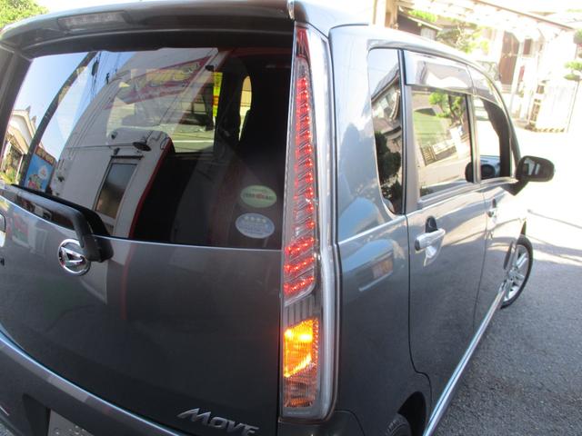 ムーヴ カスタム RS SA 禁煙車 ターボ HIDヘッドライト スマートキー プッシュスタート フルエアロ リアスポ 純正アルミ 純正革シートカバー セキュリティ レーダーブレーキ MOMOステアリング Tチェーン式エンジン(9枚目)