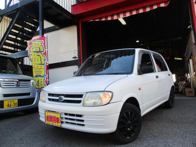 ミラ ＣＤ　５速ＭＴ　スポーツアルミホイール　スポーツマフラー　社外ハンドル　パワーウインドウ（20枚目）