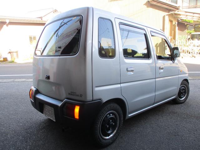 ワゴンＲ ＦＧ　５速ＭＴ　禁煙車　タイミングベルト交換済み　社外エアクリーナ　社外ハンドル　社外足回り　社外マフラー　社外ホイール　キセノンヘッドライト　ナビ　ＥＴＣ　ビレットグリル　メッキパーツ　リアスモーク施工（4枚目）