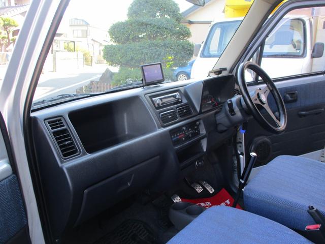 ワゴンＲ ＦＧ　５速ＭＴ　禁煙車　タイミングベルト交換済み　社外エアクリーナ　社外ハンドル　社外足回り　社外マフラー　社外ホイール　キセノンヘッドライト　ナビ　ＥＴＣ　ビレットグリル　メッキパーツ　リアスモーク施工（20枚目）