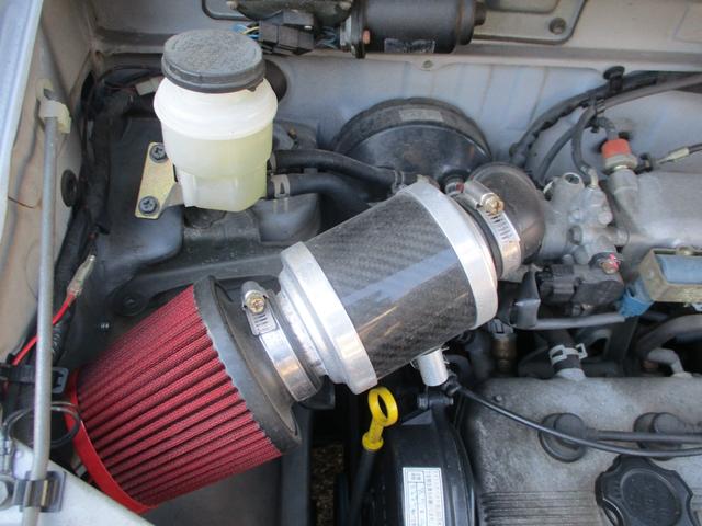 ワゴンＲ ＦＧ　５速ＭＴ　禁煙車　タイミングベルト交換済み　社外エアクリーナ　社外ハンドル　社外足回り　社外マフラー　社外ホイール　キセノンヘッドライト　ナビ　ＥＴＣ　ビレットグリル　メッキパーツ　リアスモーク施工（21枚目）