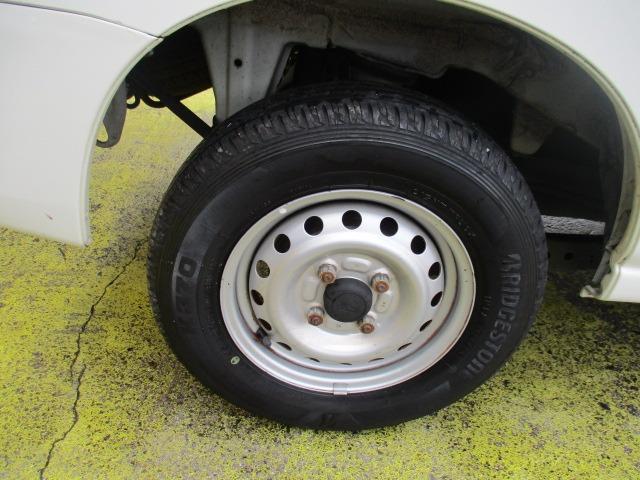 ハイゼットカーゴ スペシャル　ハイルーフ　グー故障診断済　車検２年　整備付　保証　禁煙　最大積載量３５０ｋｇ　純正ラジオ　両スライドドア　集中ロック　ドアミラー　ドアバイザー　レベライザー　フルフラット（56枚目）