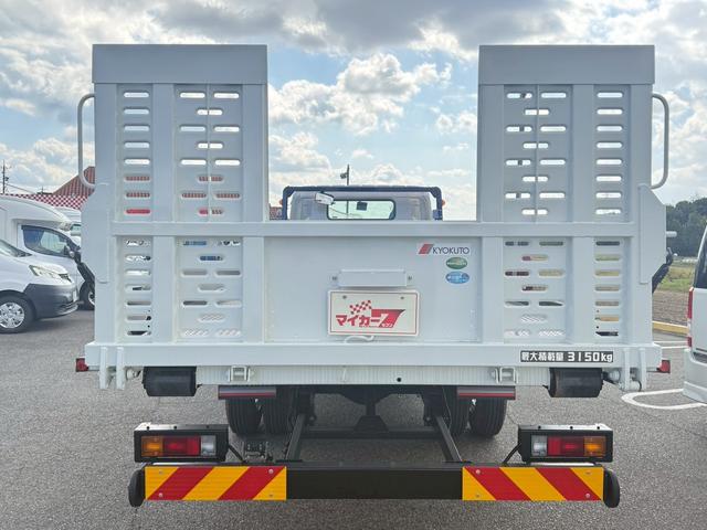 キャンター 積載車 カスタム 極東フラトップ カスタムグレード 極東フラトップ ワンオーナー 10インチ液晶メーター イージーアクセスキー バックカメラ LEDヘッドライト スマートキー ラジコン ウインチ 左電動格納ドアミラ 積載量3150kg(4枚目)