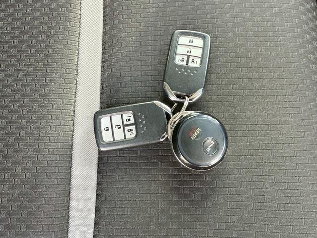 ステップワゴンスパーダ スパーダ・クールスピリット　ホンダセンシング　ワンオーナー　ＬＥＤヘッドライト　スマートキー　衝突軽減ブレーキ　純正９インチナビ　後席モニター　ＥＴＣ　バックカメラ　両側パワースライドドア　左右シートヒーター　パドルシフト　純正エンジンスターター（9枚目）