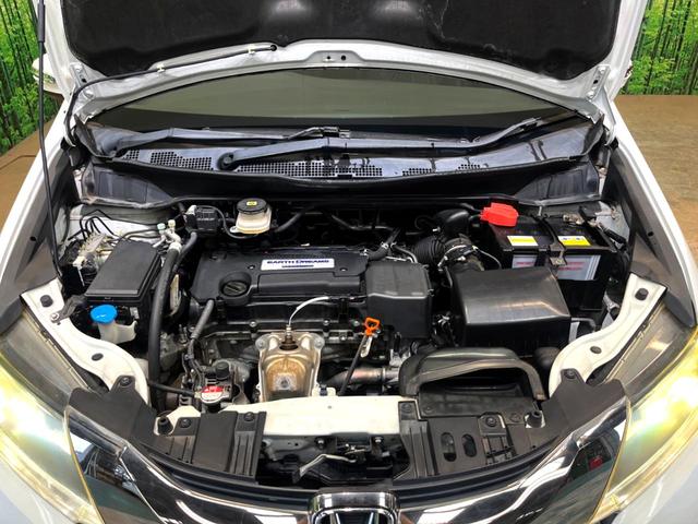 オデッセイ アブソルート・ＥＸ　純正８型ナビ　全周囲カメラ　後席モニター　黒本革シート　シートヒーター　両側電動スライドドア　ＢＳＭ　ＬＥＤヘッドライト　クルーズコントロール　ＥＴＣ　スマートキー　本革巻きステアリング（18枚目）
