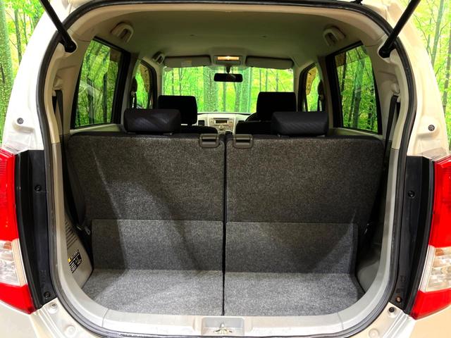 ワゴンR FXリミテッド スマートキー オートエアコン 純正14インチアルミ 純正オーディオ アームレスト シートリフター 電動格納ドアミラー バニティミラー 禁煙車(27枚目)