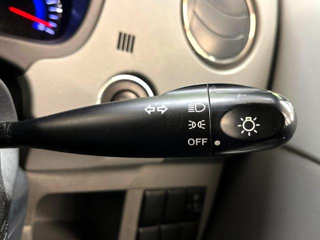 ワゴンR FXリミテッド スマートキー オートエアコン 純正14インチアルミ 純正オーディオ アームレスト シートリフター 電動格納ドアミラー バニティミラー 禁煙車(39枚目)