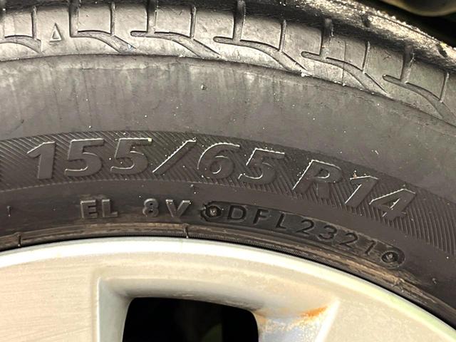 ワゴンR FXリミテッド スマートキー オートエアコン 純正14インチアルミ 純正オーディオ アームレスト シートリフター 電動格納ドアミラー バニティミラー 禁煙車(49枚目)