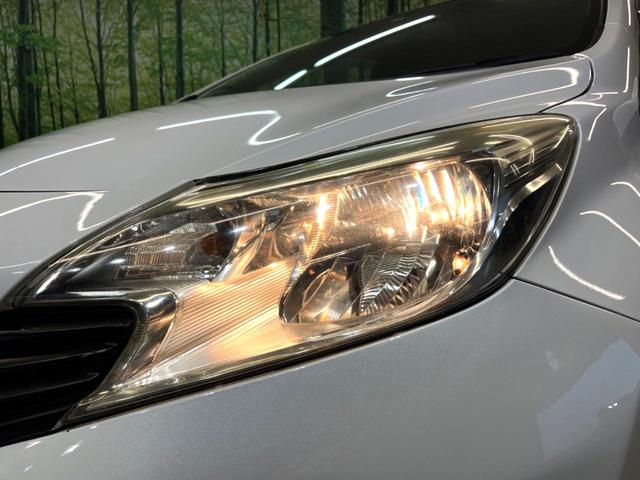 ノート Ｘ　ＳＤナビ　禁煙車　スマートキー　ＣＤ　ＤＶＤ再生　フルセグ　アイドリングストップ　シートリフター　電動格納ドアミラー（13枚目）