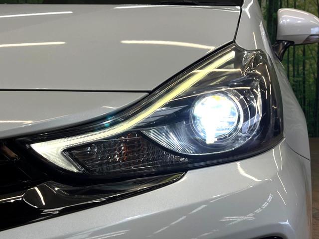 プリウスアルファ Sツーリングセレクション・G’s 純正SDナビ バックカメラ フルセグTV 専用ハーフレザーシート LEDヘッドライト 本革巻きステアリング ETC スマートキー 禁煙車 純正18インチAW ドライブレコーダー(7枚目)