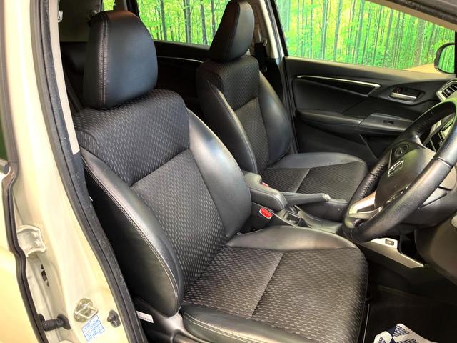 フィットハイブリッド Ｌパッケージ　純正ナビ　バックカメラ　衝突被害軽減システム　禁煙車　ハーフレザーシート　ドラレコ　スマートキー　ＬＥＤヘッド　ビルトインＥＴＣ　クルコン　オートライト　オートエアコン　Ｂｌｕｅｔｏｏｔｈ　ＣＤ（9枚目）